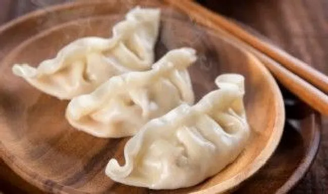 过年吃饺子的寓意是什么（过年吃年糕的寓意是什么）